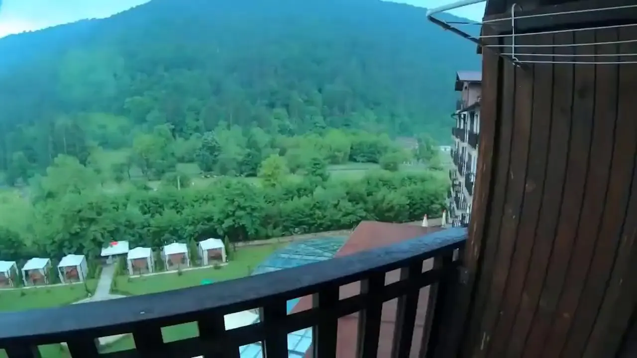 Sex on the balcony in the mountains